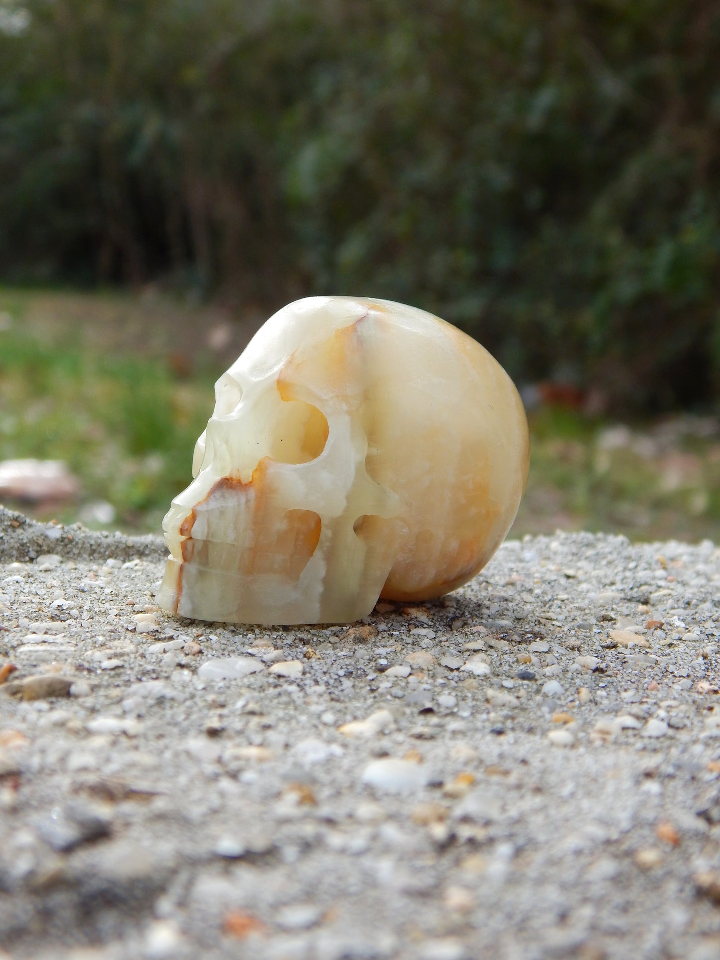 Banded calcite skull carving